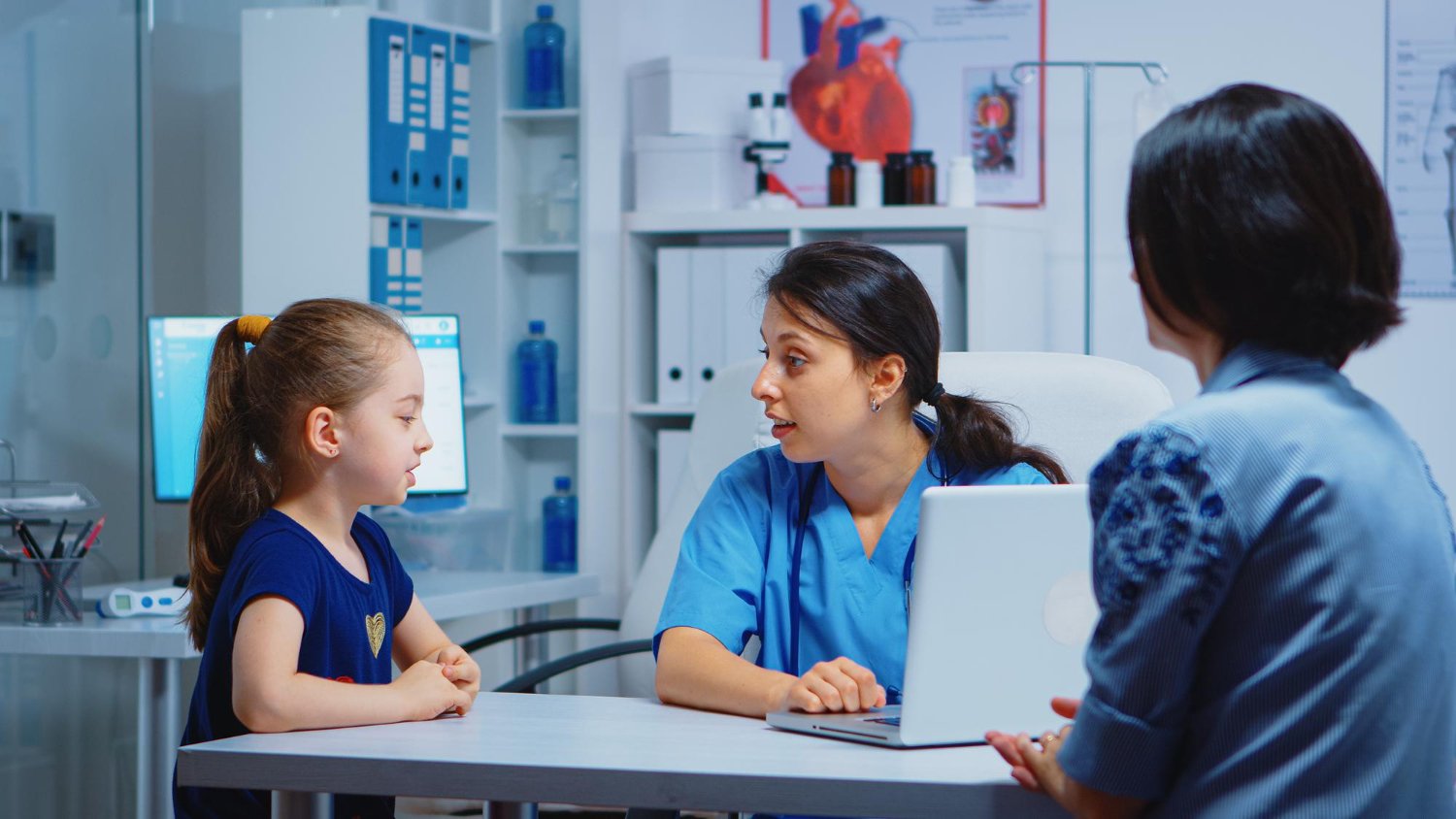 Parents asking common questions to a pediatrician at Sri Nidhi Heart and Child Clinics in Kukatpally
